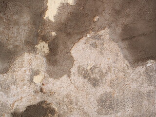 Repaired the old grunge wall with cement powder for building house. Wall Painting Preparation at home.