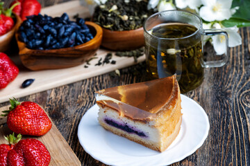 Delicious cake with blueberry filling and transparent jelly