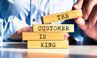 Wooden blocks with words 'The customer is king'. Business concept