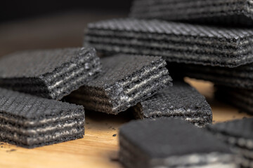 sweet dessert black waffles with creamy filling inside