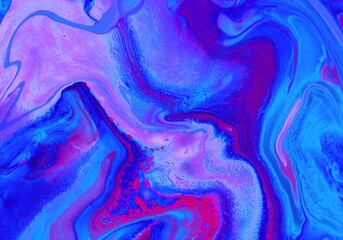 Abstract purple-blue marble background. Acrylic paint flows freely and creates an interesting pattern. Background for the cover of a laptop, notebook.