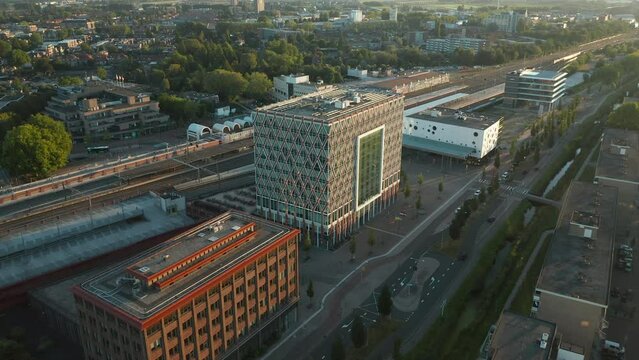Modern Buildings At Burgemeester Jamessingel Street Including Technolution B.V., New City Hall, Cinema Gouda, And Rabobank Building In Gouda, Netherlands - aerial shot