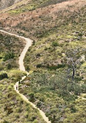 Fototapeta na wymiar people walking along the hiking path in ventura california