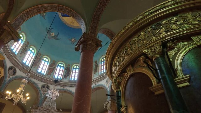 Look up inside beautiful St. George church, golden details and ceiling paitings, Coptic Cairo