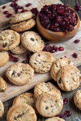 delicious dried cookies made of high-quality flour with dried red cranberries on the table