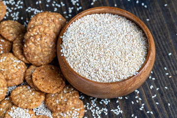 oatmeal thin round cookies with lots of sesame seeds