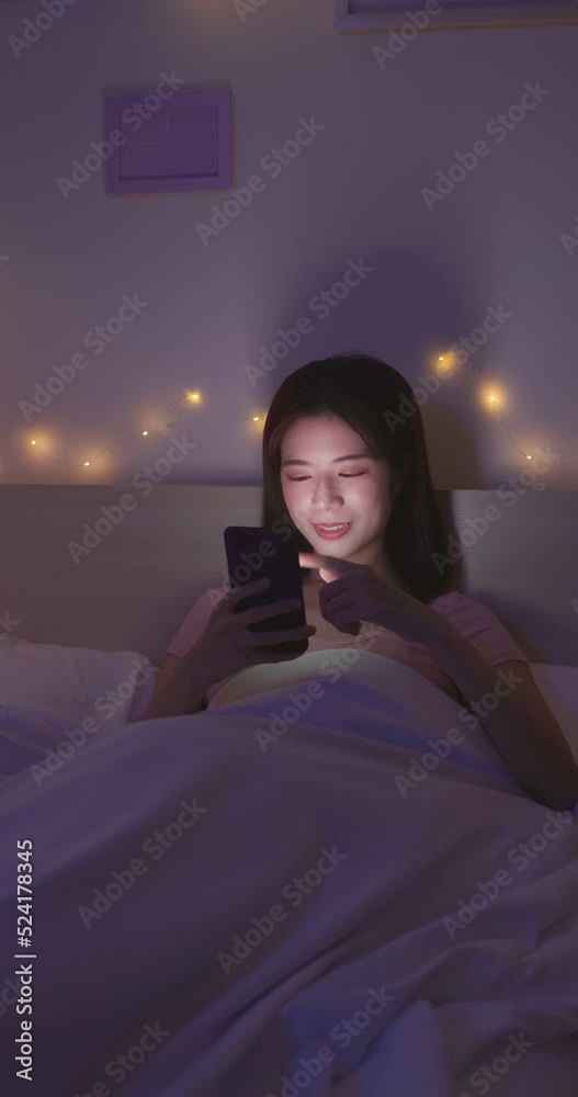 Canvas Prints woman use smartphone on bed