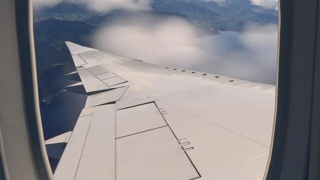 View looking through an airplane window of boeing 747