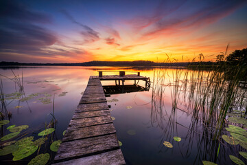 Beautiful summer sunrise over lake