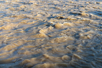 Water flood in the river after heavy rain in the valley