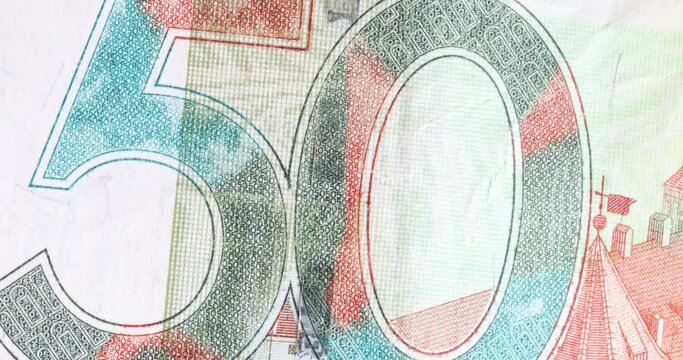 Stopmotion macro of fast changing fragments of dollar bills. Elements of apaper banknote