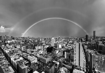 rainbow over city