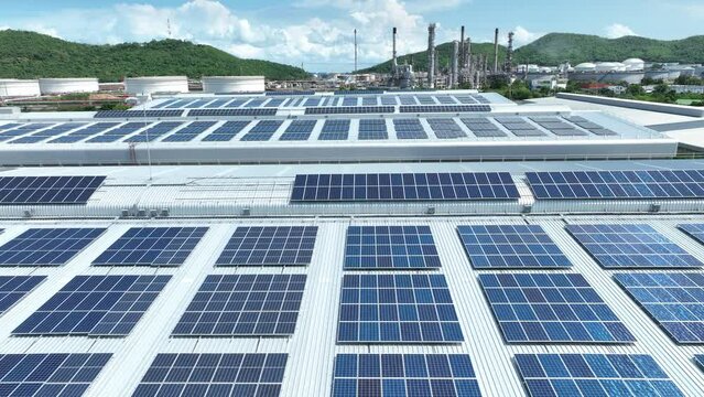 Top view Solar Cell on Warehouse Factory. Solor photo voltaic panels system power or Solar Cell on industrial building roof for producing green ecological electricity. Production of renewable energy. 