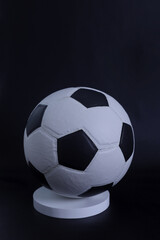 soccer ball isolated on dark background.