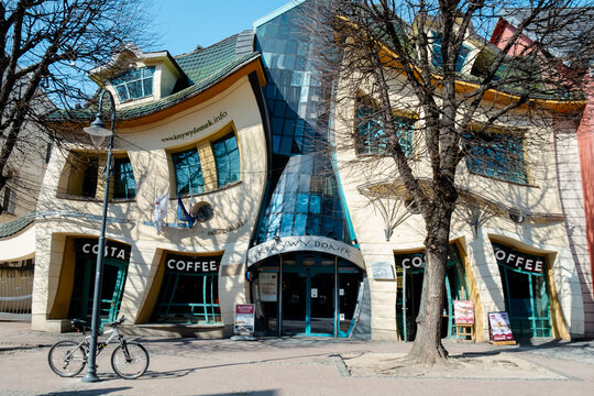 SOPOT POLAND - May 2022 Crooked house on the main Monte Cassino street in Sopot, Poland. Crooked little house Polish: Krzywy Domek is an unusually shaped building. Irregularly-shaped, one of fifty