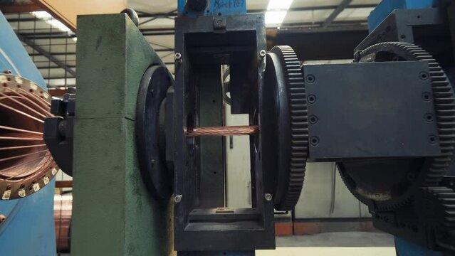 Cable Factory. Copper cable production process in a modern factory. Cable twisting machine. 4K