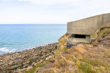 Fototapeta na wymiar Bunker near Cap Gris Nez on a calm cloudy day in summer