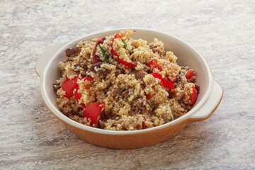 Arabic cous cous with meat and tomato