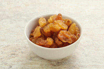 Sweet yellow raisin in the bowl