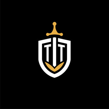 Creative letter TT logo gaming esport with shield and sword design ideas