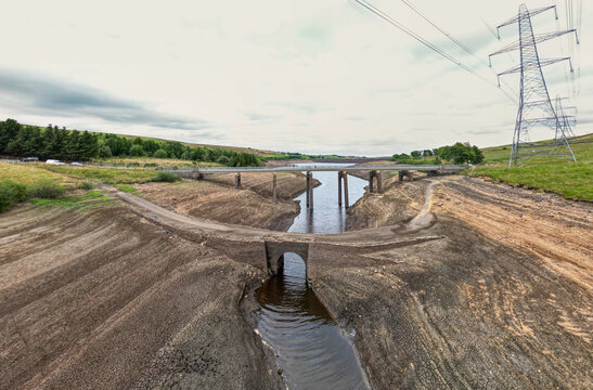An old bridge is revealed during at Baitings Reservoir during one of the hottest summers in record UK 2022