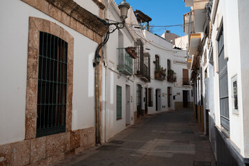 Travel destination, small Andalusian town Nerja with white houses and narrow streets on Costa del Sol, Spain