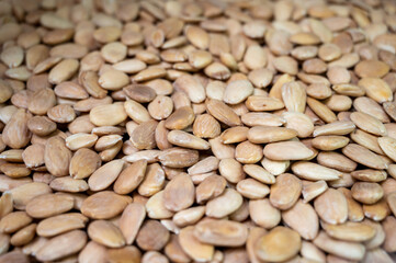 Roasted peeled almonds nuts, tasty healthy vegetarian food