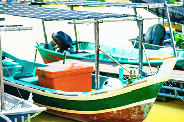 Fototapeta na wymiar Fishing boats with nobody in Terengganu, Malaysia.