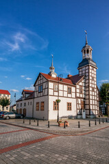 Fototapeta na wymiar Town hall with a half-timbered structure from 1697. Nowe Warpno, West Pomeranian Voivodeship, Poland.