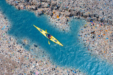 Aerial top view Kayak boat turquoise blue water sea. Concept pollution garbage plastic ocean