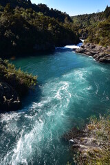 Fast flowing waters of Waikato River at Aratiatia Rapids. Location: Taupo New Zealand