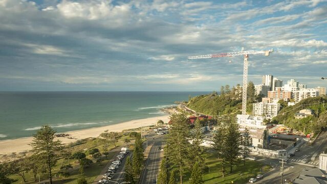 Time lapse of an elevated view of Kirra Point, Queensland, Australia, during the day with clouds moving left to right.