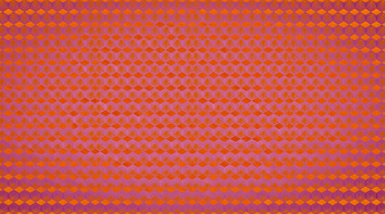 Abstract pink orange colored worn grunge cement concrete stone tile wall texture background with rhombus diamond lozenge rue print seamless pattern