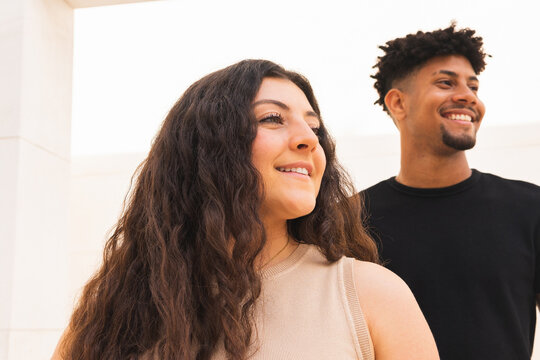 Portrait Of smiling multiracial Couple.