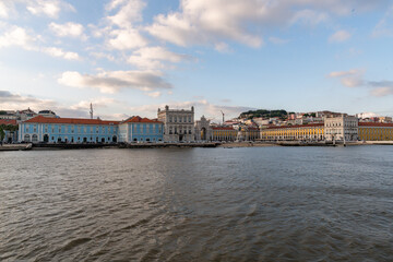 Fototapeta na wymiar The Praça do Comércio (Commerce Plaza) is a large, harbour-facing plaza in Portugal's capital, Lisbon as seen from the river Tagus