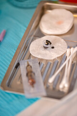 Tattoo Accessories and Tools for Tattoo Cosmetologist Preparing For Permanent Makeup Procedure In...