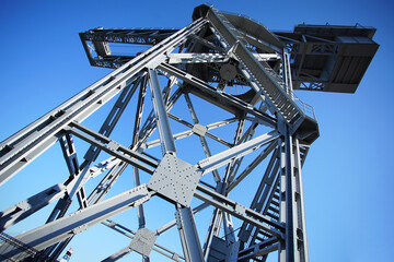Blue sky and steel crane building