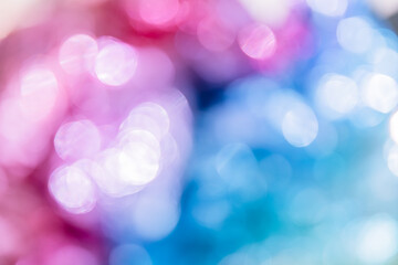 Blurred bokeh background for Christmas and New Year holiday. Abstract colorful wallpaper with...