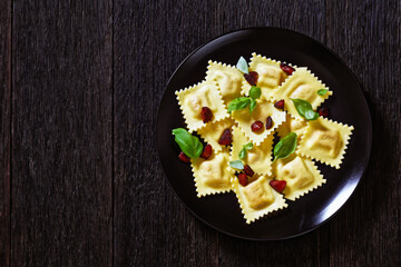 italian ravioli with chorizo ricotta filling on plate