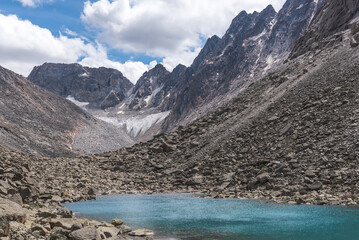 mountains glacier lake snow stones summer