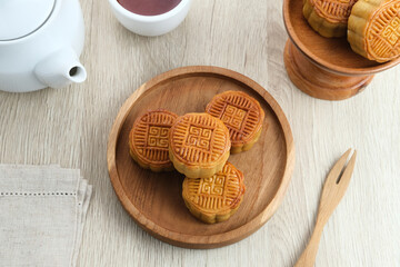 Fototapeta na wymiar Moon Cake, traditional Chinese snack popular during the mid-autumn festival. 
