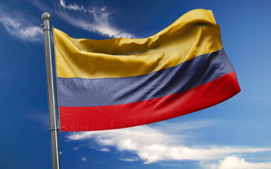 Colombian Flag is Waving Against Blue Sky with Clouds