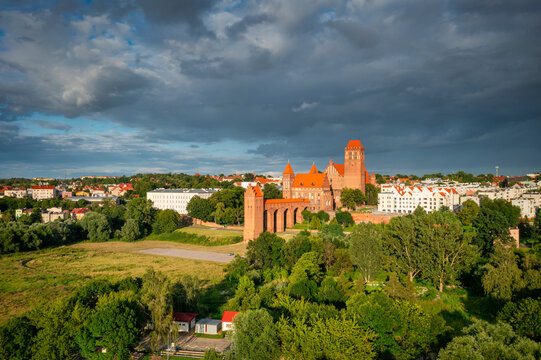 The castle and cathedral in Kwidzyn illuminated by the setting sun, Poland