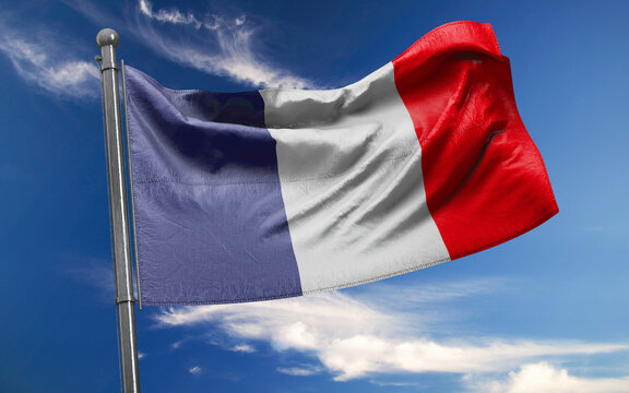 French Flag is Waving Against Blue Sky with Clouds
