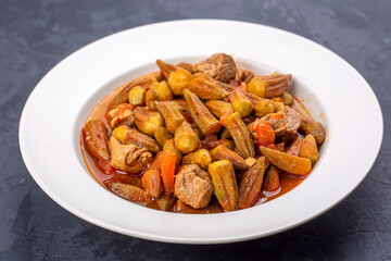 Bamya, Turkish traditional food. (Turkish cuisine) Homemade Food Okra in Plate. Organic Food.