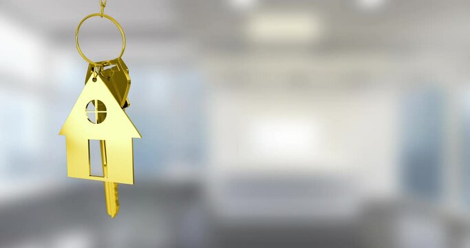 Animation of golden house keys hanging against blurred background with copy space