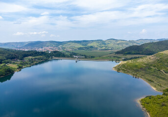 an aerial view of Bezid lake - Romania