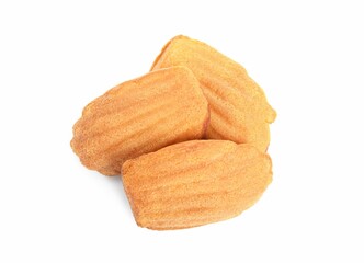 Delicious madeleine cakes on white background, top view