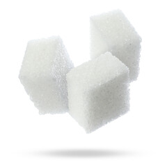 Flying cubes of sugar on white background