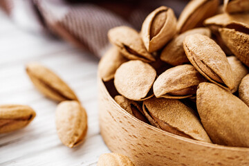 fresh almonds in shell on a white background